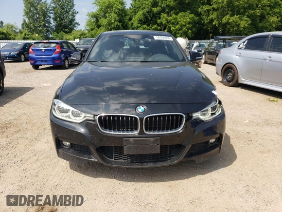 2018 BMW 3 Series 330i xDrive with VIN WBA8D9G57JNU69424, listed as a Copart auction lot 60550005 with 106,769 mi miles and Clean title. Bid and sale history available at DreamBid. Image 5.