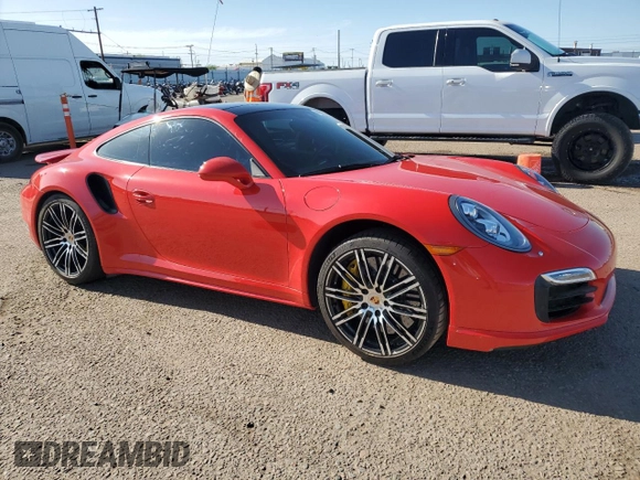 2015 Porsche 911 Turbo S z VIN WP0AD2A9XFS166153, wystawiony jako Copart lot #49815853 z przebiegiem 20 184 mil mil oraz . Historia ofert i sprzedaży dostępna na DreamBid. Obrazek 4.