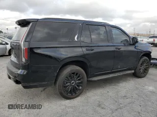 2023 Cadillac Escalade 4WD Premium Luxury with VIN 1GYS4BKL5PR388049, listed as a Copart auction lot 54626395 with 28,152 mi miles and Salvage title. Bid and sale history available at DreamBid. Image 3.
