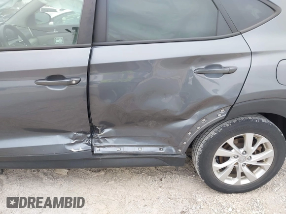 2021 Hyundai Tucson SE with VIN KM8J23A40MU299596, listed as a IAAI auction lot 41513198 with 54,284 mi miles and . Bid and sale history available at DreamBid. Image 6.