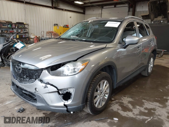 2015 Mazda CX-5 Sport z VIN JM3KE2BE8F0434889, wystawiony jako IAAI lot #42259894 z przebiegiem 298 835 mil mil oraz . Historia ofert i sprzedaży dostępna na DreamBid. Obrazek 17.