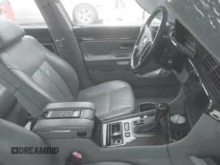 1998 BMW 7 Series 740il with VIN WBAGJ8327WDM19260, listed as a IAAI auction lot 41482326 with 1 mi miles. Bid and sale history available at carsss.com. Image 5.