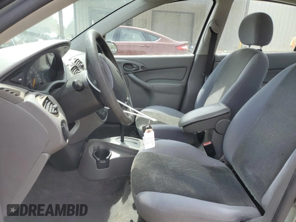 2004 Ford Focus SE z VIN 1FAFP34384W130421, wystawiony jako Copart lot #54045255 z przebiegiem 172 319 mil mil oraz Szkoda całkowita • Salvage title. Historia ofert i sprzedaży dostępna na DreamBid. Obrazek 7.