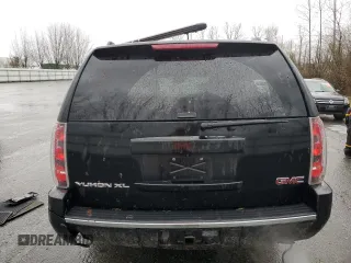 2014 GMC Yukon XL Denali with VIN 1GKS2MEF3ER133527, listed as a Copart auction lot 46869275 with 145,014 mi miles and Salvage Title. Bid and sale history available at carsss.com. Image 6.