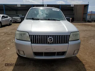 2007 Mercury Mariner Luxury z VIN 4M2YU91117KJ02032, wystawiony jako Copart lot #50418815 z przebiegiem 128 498 mil mil oraz Szkoda całkowita • Salvage title. Historia ofert i sprzedaży dostępna na DreamBid. Obrazek 5.