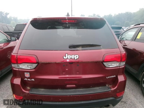 2021 Jeep Grand Cherokee Laredo X with VIN 1C4RJFAG3MC611583, listed as a IAAI auction lot 42631284 with 99,457 mi miles and . Bid and sale history available at DreamBid. Image 15.