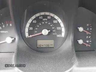 2005 Kia Sportage LX with VIN KNDJF723757087655, listed as a IAAI auction lot 41706354 with 164,736 mi miles and . Bid and sale history available at carsss.com. Image 7.