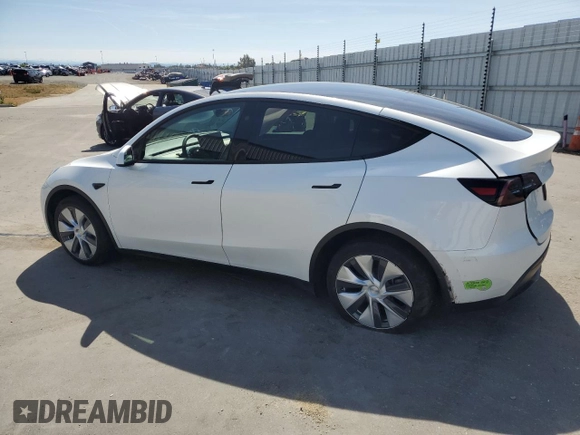 2023 Tesla Model Y Long Range z VIN 7SAYGDEE8PF816544, wystawiony jako Copart lot #57170485 z przebiegiem 74 598 mil mil oraz Szkoda całkowita • Salvage title. Historia ofert i sprzedaży dostępna na DreamBid. Obrazek 2.