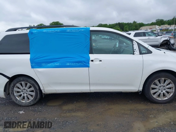 2013 Toyota Sienna LE with VIN 5TDJK3DC9DS055134, listed as a IAAI auction lot 42255532 with 156,381 mi miles and . Bid and sale history available at DreamBid. Image 13.