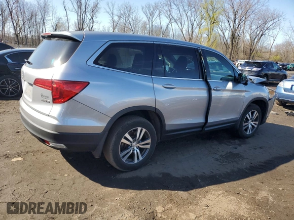 2017 Honda Pilot EX-L with VIN 5FNYF6H54HB103603, listed as a Copart auction lot 52052785 with 117,742 mi miles and Salvage Title. Bid and sale history available at DreamBid. Image 3.