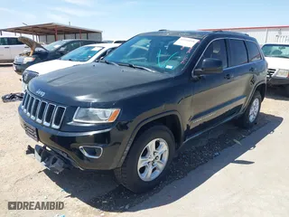 2014 Jeep Grand Cherokee Laredo with VIN 1C4RJEAG1EC348070, listed as a IAAI auction lot 41950898 with 129,883 mi miles. Bid and sale history available at carsss.com. Image 17.