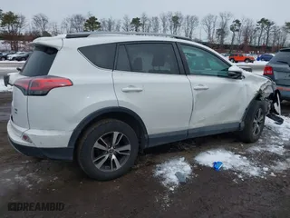 2017 Toyota RAV4 XLE with VIN 2T3RFREV4HW673525, listed as a IAAI auction lot 41503904 with 75,281 mi miles. Bid and sale history available at carsss.com. Image 4.