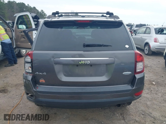2016 Jeep Compass Latitude with VIN 1C4NJDEB4GD687300, listed as a IAAI auction lot 41800186 with 169,374 mi miles. Bid and sale history available at carsss.com. Image 16.