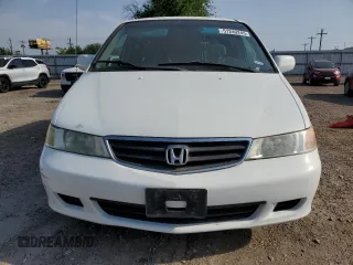 2003 Honda Odyssey EX z VIN 5FNRL18663B111901, wystawiony jako Copart lot #51240245 z przebiegiem 115 202 mil mil oraz Szkoda całkowita • Salvage title. Historia ofert i sprzedaży dostępna na DreamBid. Obrazek 5.
