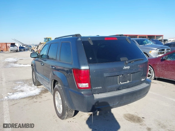 2007 Jeep Grand Cherokee Laredo with VIN 1J8GS48K97C538509, listed as a IAAI auction lot 41605236 with 164,530 mi miles. Bid and sale history available at carsss.com. Image 3.