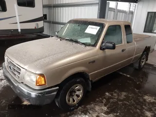 2001 Ford Ranger XL with VIN 1FTYR14V31PB58474, listed as a IAAI auction lot 41806958 with 300,219 mi miles. Bid and sale history available at carsss.com. Image 6.