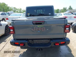 2021 Jeep Gladiator Rubicon with VIN 1C6JJTBG2ML515932, listed as a IAAI auction lot 42471704 with 57,775 mi miles and . Bid and sale history available at DreamBid. Image 17.