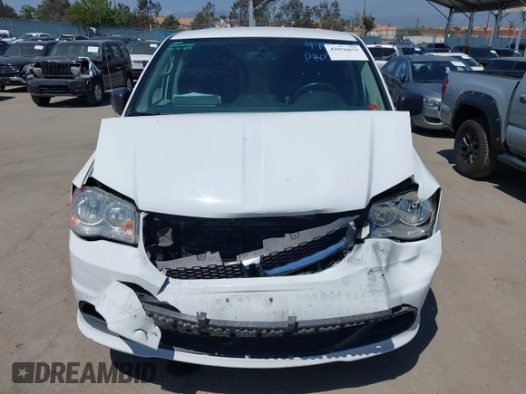 2016 Dodge Grand Caravan SE with VIN 2C4RDGBG2GR311654, listed as a IAAI auction lot 42056032 with 185,330 mi miles and . Bid and sale history available at DreamBid. Image 12.