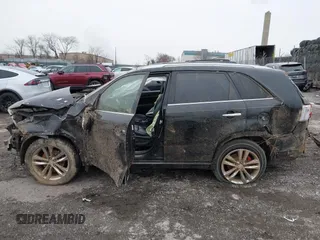 2014 Kia Sorento SX Limited with VIN 5XYKWDA70EG440053, listed as a IAAI auction lot 41565177 with 106,706 mi miles. Bid and sale history available at carsss.com. Image 13.