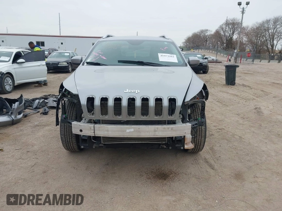 2014 Jeep Cherokee Latitude with VIN 1C4PJMCS7EW220899, listed as a IAAI auction lot 41973561 with 135,572 mi miles. Bid and sale history available at carsss.com. Image 13.