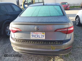 2023 Volkswagen Jetta Sport z VIN 3VWBM7BU5PM035014, wystawiony jako IAAI lot #41818798 z przebiegiem 21 202 mil mil oraz . Historia ofert i sprzedaży dostępna na DreamBid. Obrazek 16.