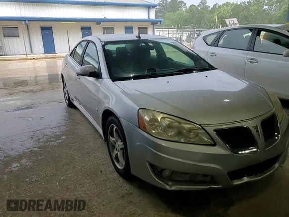 2009 Pontiac G6 GT 1SB z VIN 1G2ZK57K694233980, wystawiony jako Copart lot #54146815 z przebiegiem 96 973 mil mil oraz Szkoda całkowita • Salvage title. Historia ofert i sprzedaży dostępna na DreamBid. Obrazek 13.