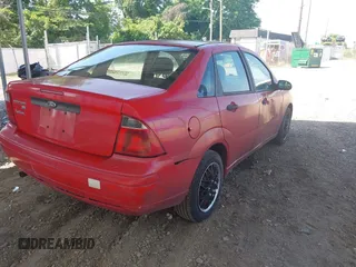 2007 Ford Focus S z VIN 1FAFP34N07W363568, wystawiony jako IAAI lot #42557496 z przebiegiem 120 123 mil mil oraz . Historia ofert i sprzedaży dostępna na DreamBid. Obrazek 4.