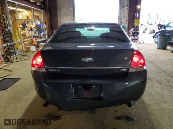 2015 Chevrolet Impala LS with VIN 2G1WA5E36F1171137, listed as a Copart auction lot 63060935 with 148,000 mi miles and Salvage title. Bid and sale history available at DreamBid. Image 6.