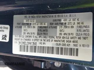 2022 Mazda CX-30 S Premium with VIN 3MVDMBDL0NM413545, listed as a IAAI auction lot 42493594 with 57,013 mi miles and . Bid and sale history available at DreamBid. Image 9.
