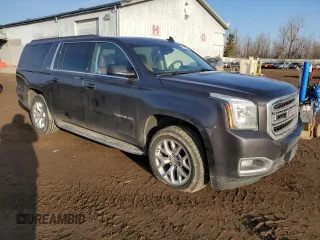 2015 GMC Yukon XL SLT with VIN 1GKS2HKC7FR533710, listed as a Copart auction lot 48336335 with 183,731 mi miles and Clean Title. Bid and sale history available at carsss.com. Image 4.