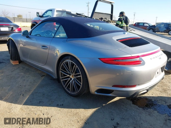 2019 Porsche 911 Carrera with VIN WP0CA2A92KS129254, listed as a IAAI auction lot 41392032 with 26,153 mi miles. Bid and sale history available at carsss.com. Image 3.