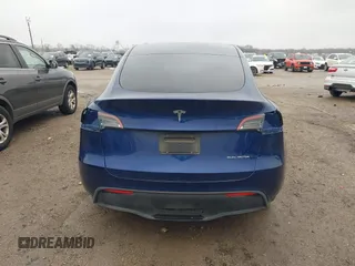 2023 Tesla Model Y Long Range with VIN 7SAYGDEE4PA064743, listed as a IAAI auction lot 41523760 with 41,113 mi miles. Bid and sale history available at carsss.com. Image 16.