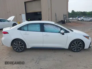 2022 Toyota Corolla SE with VIN 5YFS4MCE0NP136332, listed as a IAAI auction lot 42094001 with 36,371 mi miles and . Bid and sale history available at DreamBid. Image 13.