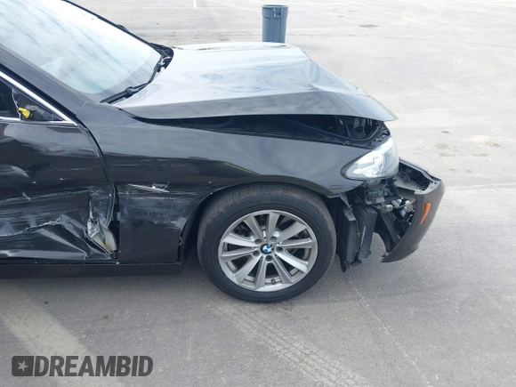 2014 BMW 5 Series 528i with VIN WBA5A5C52ED503033, listed as a IAAI auction lot 41562997 with 127,564 mi miles. Bid and sale history available at carsss.com. Image 14.