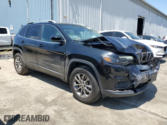 2019 Jeep Cherokee Latitude Plus with VIN 1C4PJMLBXKD233718, listed as a Copart auction lot 58933435 with 56,413 mi miles and Salvage title. Bid and sale history available at DreamBid. Image 4.
