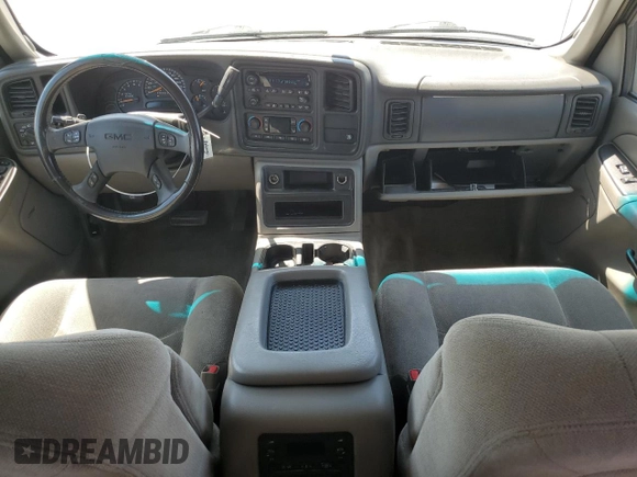 2006 GMC Yukon SLT z VIN 1GKEC13Z86R136883, wystawiony jako Copart lot #54771355 z przebiegiem 184 641 mil mil oraz Szkoda całkowita • Salvage title. Historia ofert i sprzedaży dostępna na DreamBid. Obrazek 8.