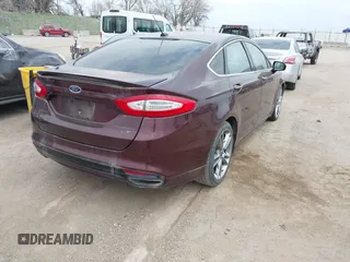 2013 Ford Fusion Titanium with VIN 3FA6P0K9XDR324165, listed as a IAAI auction lot 42068565 with 147,330 mi miles and . Bid and sale history available at DreamBid. Image 4.