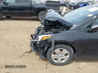 2018 Kia Forte LX with VIN 3KPFK4A77JE189410, listed as a IAAI auction lot 42070033 with 97,698 mi miles. Bid and sale history available at carsss.com. Image 6.
