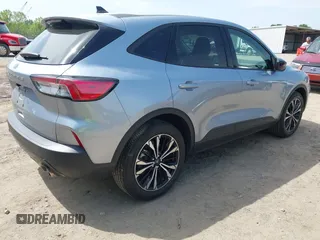2022 Ford Escape SE z VIN 1FMCU0G68NUB64197, wystawiony jako IAAI lot #42279268 z przebiegiem 10 579 mil mil oraz . Historia ofert i sprzedaży dostępna na DreamBid. Obrazek 4.