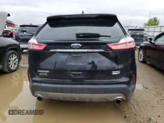 2020 Ford Edge SEL с VIN 2FMPK4J90LBA34676, выставлен на аукционе Copart как лот 55577665 с пробегом 113 214 миль миль и Списание • Salvage title. История ставок и продаж доступна на DreamBid. Изображение 6.