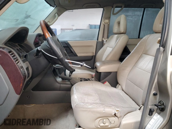 2001 Mitsubishi Montero Limited z VIN JA4MW51R71J038583, wystawiony jako Copart lot #83024384 z przebiegiem 157 538 mil mil oraz Szkoda całkowita • Salvage title. Historia ofert i sprzedaży dostępna na DreamBid. Obrazek 7.