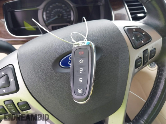 2013 Ford Taurus Limited with VIN 1FAHP2F8XDG127848, listed as a IAAI auction lot 42498773 with 103,299 mi miles and . Bid and sale history available at DreamBid. Image 11.