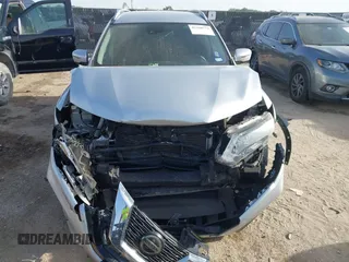 2019 Nissan Rogue SV with VIN KNMAT2MT0KP527901, listed as a IAAI auction lot 42260779 with 102,975 mi miles and . Bid and sale history available at DreamBid. Image 12.