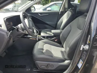 2023 Kia Niro EV Wind with VIN KNDCR3L16P5045630, listed as a Copart auction lot 51439095 with 51,784 mi miles and Clean Title. Bid and sale history available at carsss.com. Image 7.