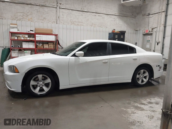 2013 Dodge Charger SE with VIN 2C3CDXBG0DH537056, listed as a IAAI auction lot 42047266 with 132,412 mi miles and . Bid and sale history available at DreamBid. Image 14.