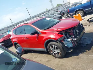 2016 Toyota RAV4 LE with VIN JTMZFREV1GJ098247, listed as a IAAI auction lot 42065800 with 199,172 mi miles and . Bid and sale history available at DreamBid. Image 13.