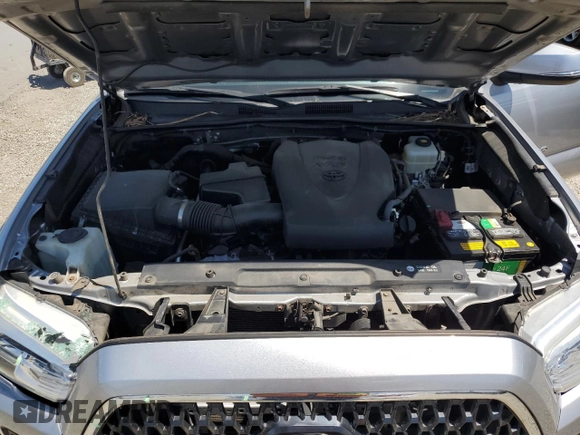 2018 Toyota Tacoma SR with VIN 3TMCZ5AN6JM129370, listed as a Copart auction lot 63042425 with 65,189 mi miles and Salvage title. Bid and sale history available at DreamBid. Image 11.