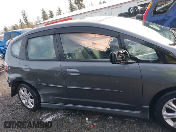 2011 Honda Fit Sport z VIN JHMGE8H54BC000162, wystawiony jako IAAI lot #41665321 z przebiegiem 154 531 mil mil oraz . Historia ofert i sprzedaży dostępna na DreamBid. Obrazek 14.