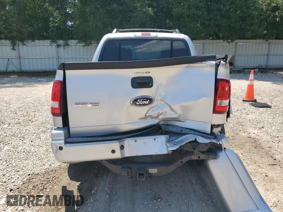 2010 Ford Explorer Sport Trac Limited с VIN 1FMEU3DEXAUA00384, выставлен на аукционе Copart как лот 62176895 с пробегом 114 115 миль миль и Списание • Salvage title. История ставок и продаж доступна на DreamBid. Изображение 6.