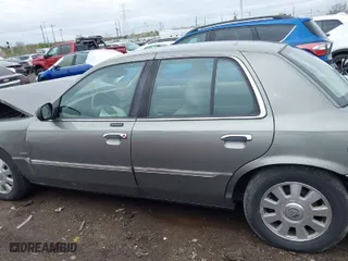 2003 Mercury Grand Marquis LS Premium with VIN 2MEFM75W33X655360, listed as a IAAI auction lot 41922734 with 86,059 mi miles. Bid and sale history available at carsss.com. Image 15.